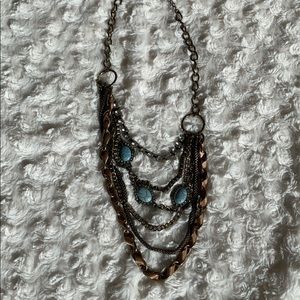 Multi layer gold-colored necklace